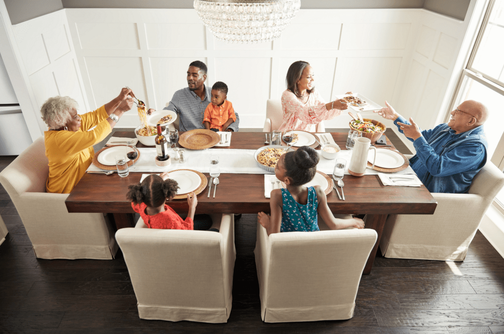 Family having breakfast at the dining table | The Carpet Factory Super Store